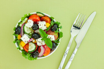Green salad with tomato and fresh vegetables