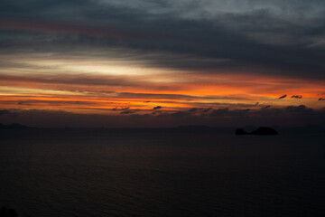 Fototapeta na wymiar Beautiful red sunset over the ocean or sea.