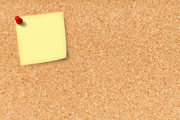 cork board with blank note