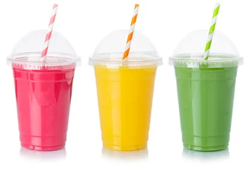 Schilderijen op glas Fruit juice straw drink drinks in a cup healthy eating isolated on white © Markus Mainka