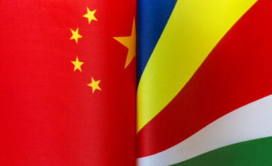 fragments of the national flags of China and the Republic of Seychelles close up
