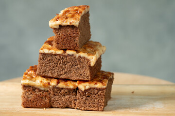 Group of toffee cake on wood tray