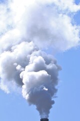 Smoke in the sky from polluting factory 