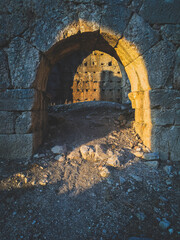 ruins of the old buildings in the sunset