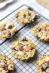 Mixed Nut and Dried fruits and Seeds Florentine, Gluten free whole foods Healthy biscuit cookies. set on cafe table.
