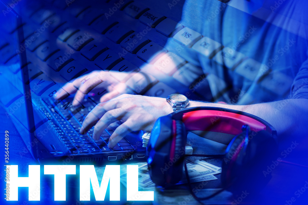 Poster html development. man writes the code. hands of a man on a lapto