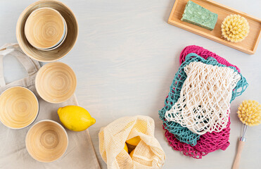 Zero waste kit. Set of eco friendly bamboo cutlery, mesh cotton bag, reusable coffee tumbler, brushes and water bottle. Sustainable, ethical, plastic free