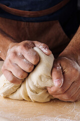 making dough man hand flour