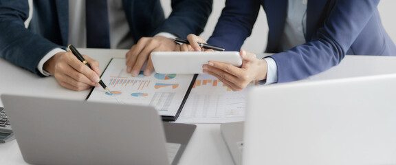 Financial inspector calculating a numbers in office room.