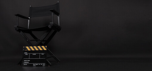 ฺBlack Director chair and Clapper board or movie slate use in video production or film and cinema...