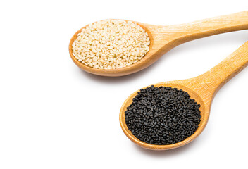 white and black sesame seeds with spoon isolated on white background
