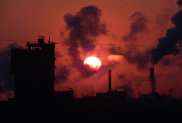 The industrial landscape and evening sky in winter