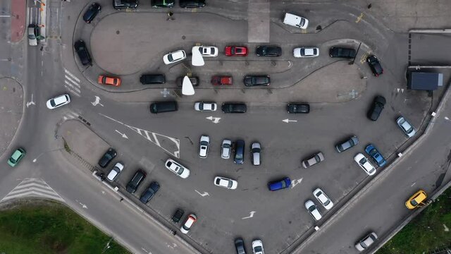 Timelapse car queue at a fast food restaurant in the parking lot. Two lines of receiving orders from buyers in cars. FullHD footage.