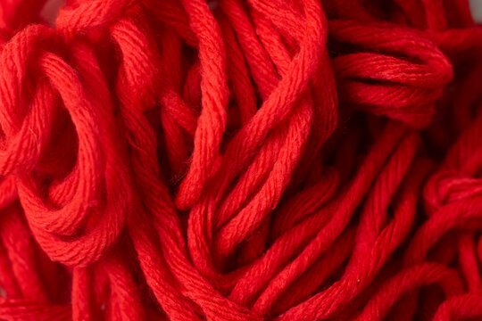 Detail of  red yarn textile