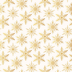 Golden snowflakes seamless pattern.  Magic holiday texture for Merry Christmas. Vector isolated winter gold festive background for wrapping paper.
