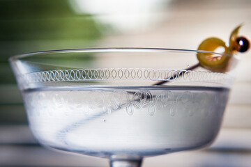 Vesper martini cocktail with a lemon peel garnish.