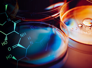 Pills in test tube over blue background.