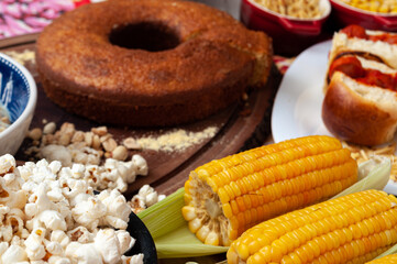 colorful table with lots of delicious food served in Brazilian June parties