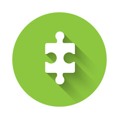 White Piece of puzzle icon isolated with long shadow. Business, marketing, finance, layout, infographics, internet concept. Green circle button. Vector Illustration.