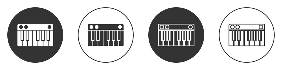 Black Music synthesizer icon isolated on white background. Electronic piano. Circle button. Vector Illustration.