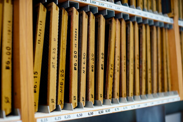shelves with screens for sifting grains of different sizes