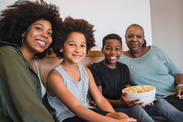 Obraz premium Grandmother, mother and children together at home.