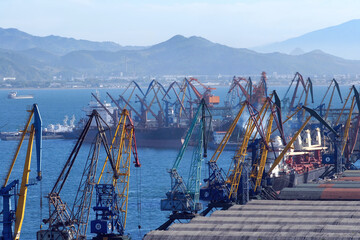 Industrial cityscape. View at the sea port and Nakhodka bay of Japan sea. Nakhodka, Primorsky Krai (Primorye), Far East, Russia.