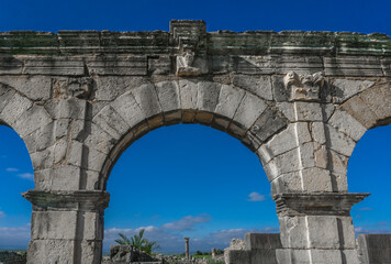 Obraz premium Volubilis - Ancient 3rd Century BC Roman ruins near city of Meknes in Morocco, UNESCO Heritage site.