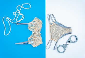 Obraz premium On a vertical blue and white background, women's underwear