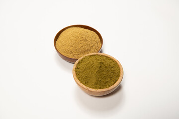 Henna powder in a wooden bowl. Natural hair care. Henna hair dye.