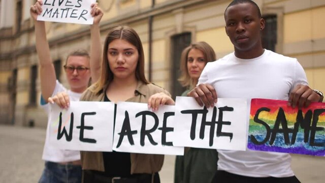 Mass protests, students on the streets of the city are holding posters with the inscription we are the same, I cant breathe, black lives matter. People protesting against rasizm and intolerance