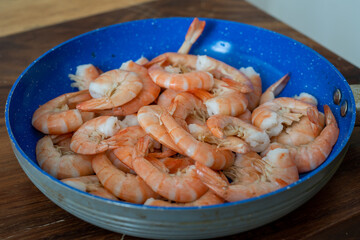 Fresh shrimp cooking and cleaning