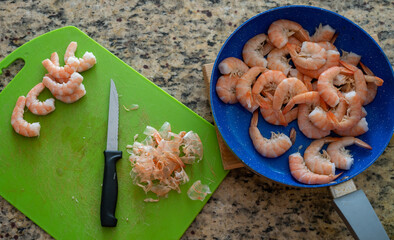 Fresh shrimp cooking and cleaning