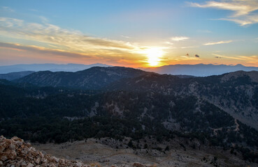 Beautiful landscape in the Taurus mountains from the top of mount Tahtali at sunset. Kemer, Turkey.