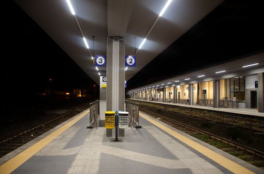 Evening shot of the train station and waiting area of passengers in Giarre, Catania , Sicily