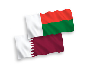 Flags of Qatar and Madagascar on a white background