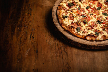 Delicious pizza in wood table