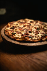 Delicious pizza in wood table