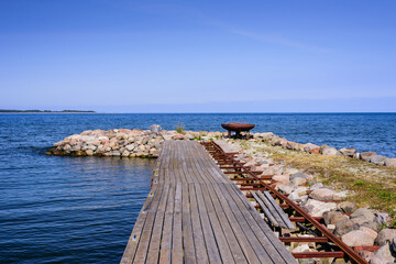 Fototapeta na wymiar Baltic sea. Picturesque wooden pier in the village Viinistu, Estonia