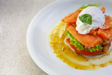 Egg benedict with smoked salmon on toast. Delicious breakfast