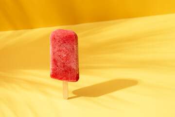 Strawberry ice cream popsicle. Fruit ice cream on a stick