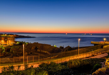 Cityscape of Tarragona. Beautiful night view of the Mediterranean coast and Tarragona town, Spain