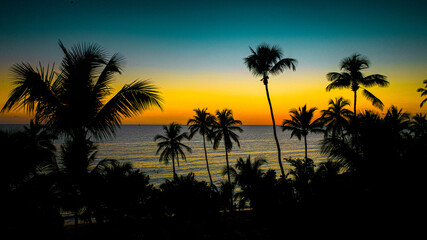 Fototapeta na wymiar aerial view of an amazing silhouette sunset in La Romana, Dominican Republic, Caribbean Sea 