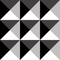 Simple seamless pattern of triangles in gray shades. Geometric pattern for fashion prints.