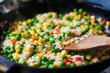 Fry vegetables in a pan. A mixture of different vegetables.
