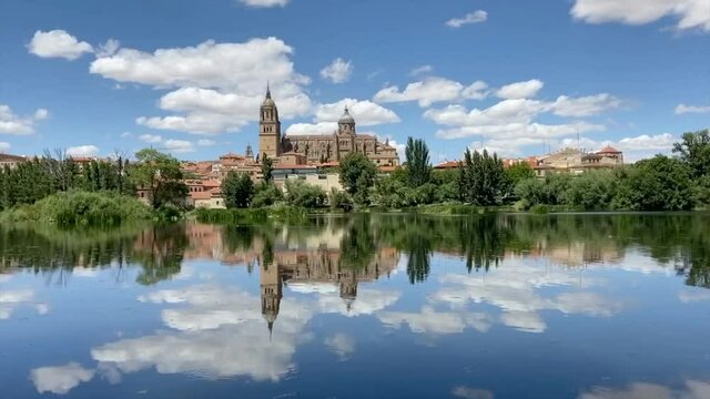 Salamanca Old and New Cathedrals reflected on Tormes River