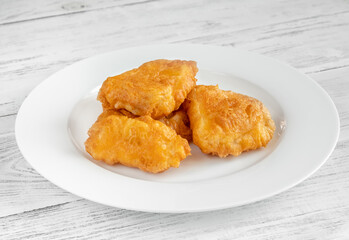 Slices of battered fish