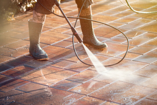 Outdoor floor cleaning with high pressure water jet