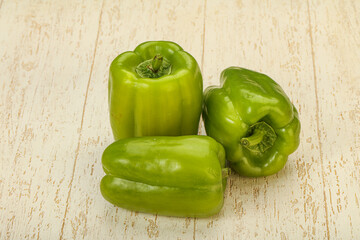 Three green bell juicy peppers