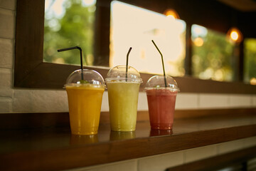 Refreshing cocktails and smoothies. Summer mood. Cocktail close-up with fresh fruits and berries.
